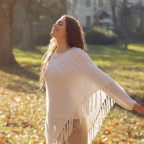 woman smiling in the sun