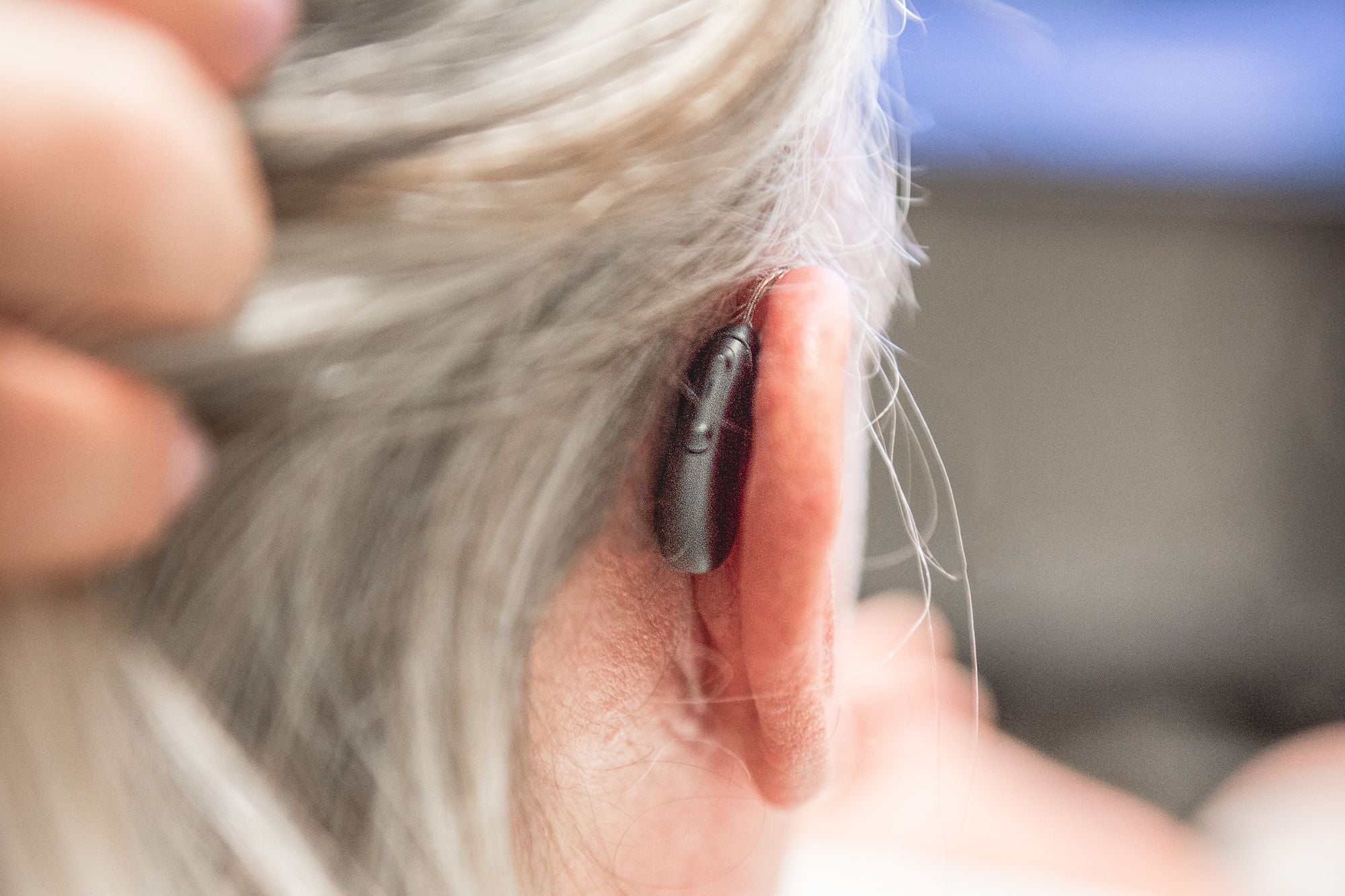 close up of hearing aid on a patients ear